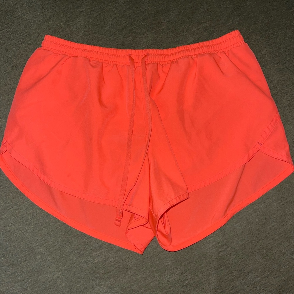 Old Navy Go Dry Active shorts 
Coral color
Size small 
Underwear lining inside